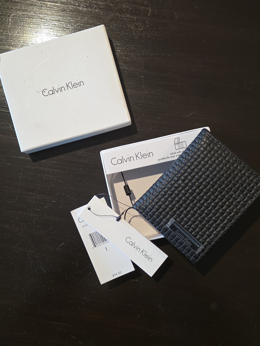 Calvin Klein Mens Genuine Leather Black Woven Like Textured Wallet